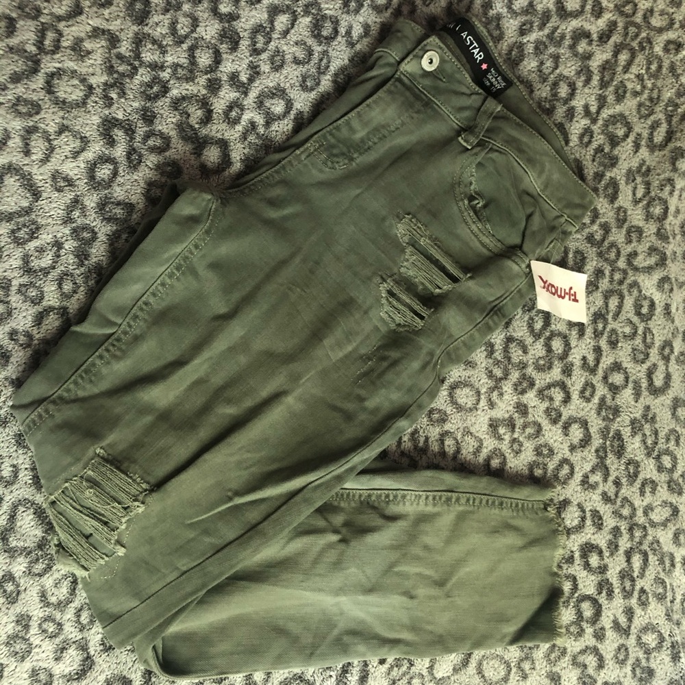Army green jeans with distressed detail
